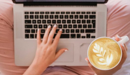 coffee cup with laptop