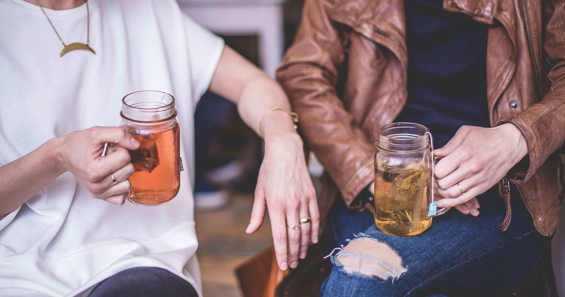 two people drinking tea together