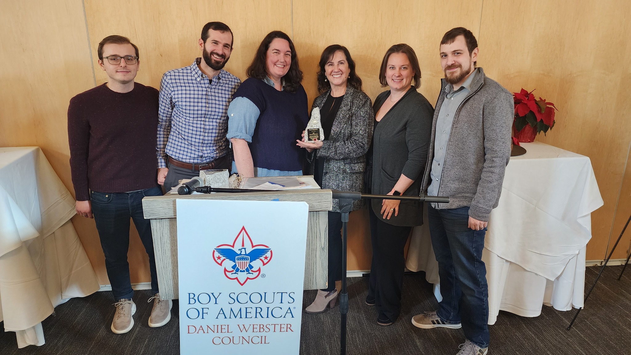 Photo of Darci Knowles and members of the DARCI team at the Good Scout award luncheon.